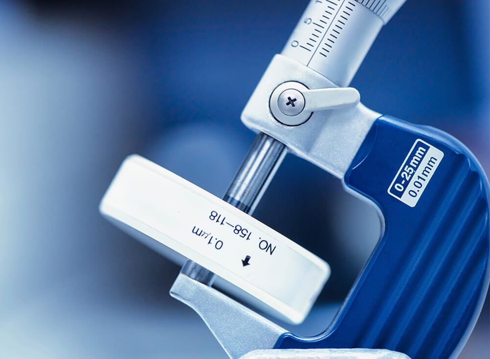 Close-up of a precision micrometer gauge tool for accurate measurement