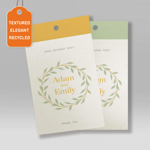 Elegant textured recycled swing tags with green leaf wreath and personal names, customised wedding thank you tags