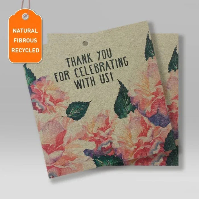 Recycled grey pulpboard swing tags with floral design and text thanking for celebrating, natural fibrous