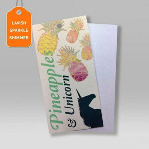 Sparkling swing tags with colourful pineapples and black unicorn silhouette on gloss finish