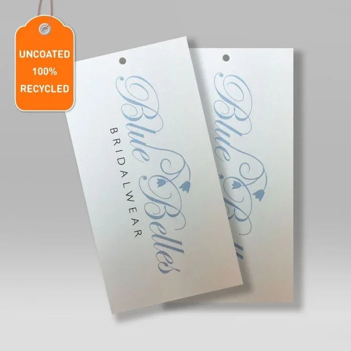 Uncoated 100% recycled orange swing tag and two personalised bridalwear tags with blue floral script on white background